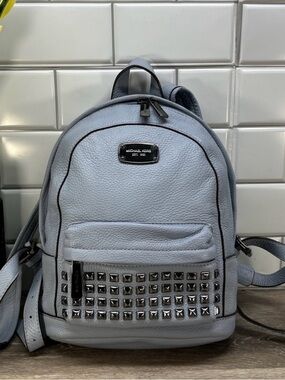 MICHAEL KORS JET SET ITEM XS STUDDED PEBBLE LEATHER BACKPACK IN PALE BLUE!